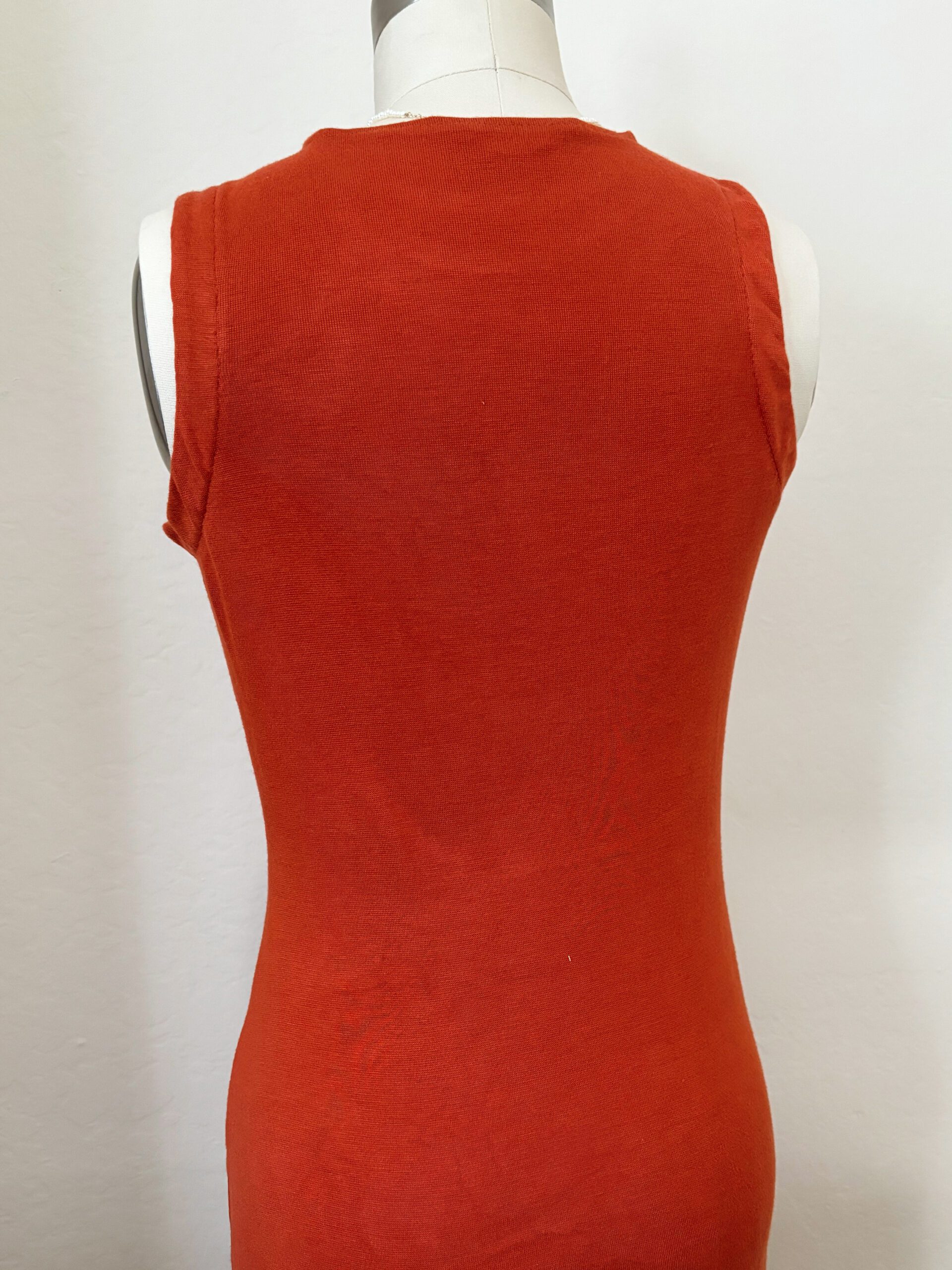 A back view of the knit dress, showcasing the racerback style.