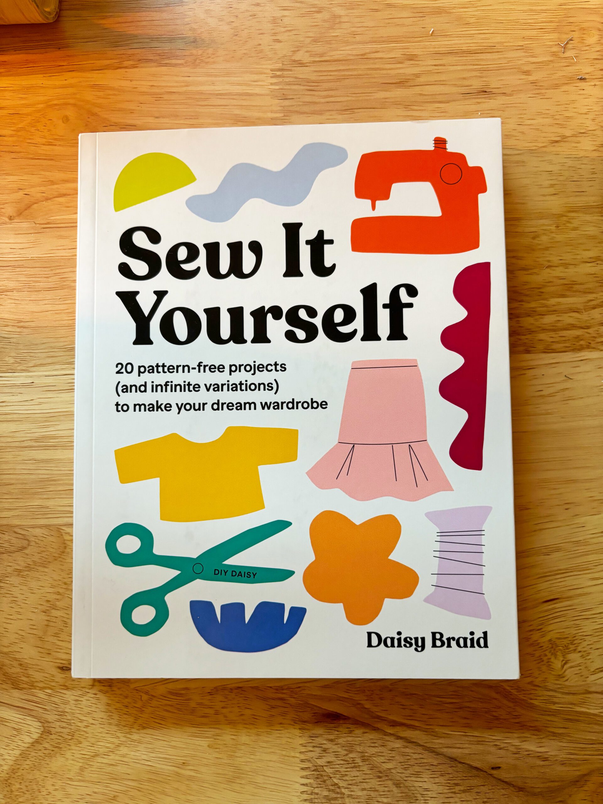 A book titled Sew It Yourself containing many DIY projects from sewing clothes to accessories.