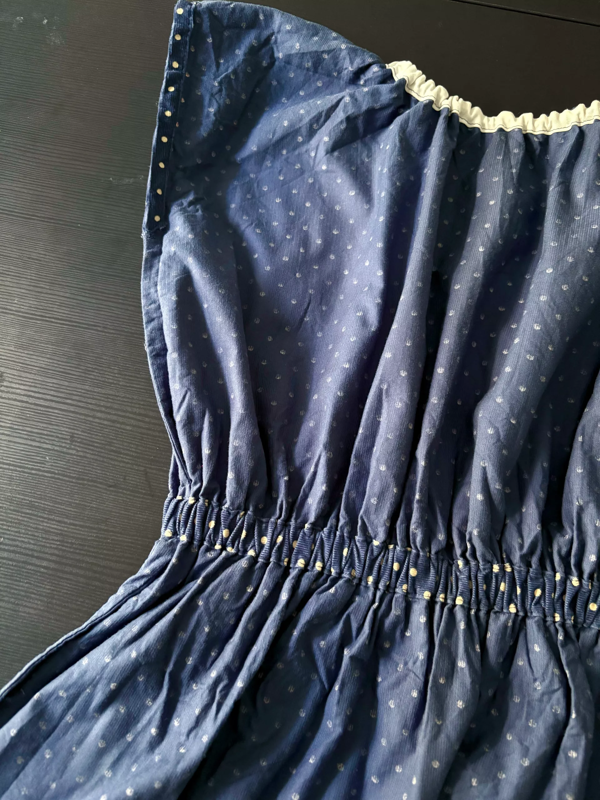 A peek inside the dress shows tidy French seam finishes.