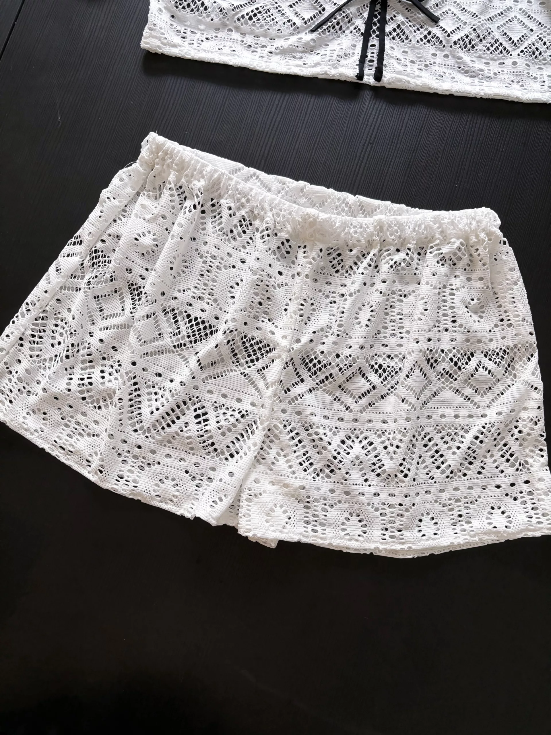 The finished matching open-knit shorts.